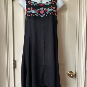 Floral embroidered beach dress purchased in Miami boutique.